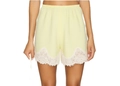 Detail of light yellow shorts featuring white lace trim hem and pleated elastic waistband - S / Neon Yellow