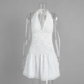 Detailed view of the smocked elastic waist and polka dot pattern on the halter neck dress - S / White