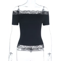 Detail of delicate black lace trim on the neckline and hem of the off-shoulder top - XS / Black