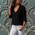 Elegante camisa negra de manga larga para mujer con cuello vuelto y cierre de botones - S / Negro