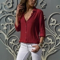 Elegant deep red long sleeve button-up shirt paired with white trousers and gold jewelry - Dark Red
