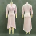 Detailed front and back view of elegant pink V-neck satin dress with irregular hemline - S / Dresses / Pink