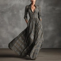 Detailansicht des Vintage-Maxikleids mit Karomuster, hoher Taille und elegantem V-Ausschnitt - S / Grau Gitter