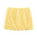 Détail de la mini-jupe à paillettes jaunes avec texture scintillante et taille haute plate - XS / Jaune