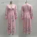 Detailed front and back view of a pink floral V-neck long-sleeve maxi dress with pleats - S / Dresses / Pink