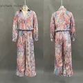 Detail of paisley print two-piece set featuring deep V-neck top and wide-leg trousers - S / Top And Bottom / Blue Floral Print