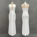 Front and back detail of white deep V-neck halter maxi dress with mermaid hem - S / White