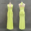 Detailed front and back view of a yellow-green halter neck dress with pleated waist detailing - S / Yellow-Green