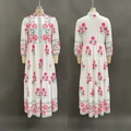 Detailed front and back view of long sleeve floral maxi dress with ruffle hem and stand collar - S / Rainbow