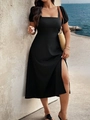 Dettaglio dell'abito nero taglie forti con scollo a cuore e spacco laterale alto - 1XL / Nero
