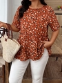 Detail of rust red leopard print blouse with tiered ruffle hem and short sleeves - XL / Orange
