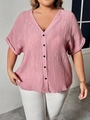 Dettaglio di camicia rosa in lino con scollo a V, trama plissettata e bottoni neri - 3XL / Rosa
