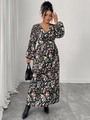 Dettaglio dello scollo a V e della stampa floreale su un abito lungo nero a maniche lunghe - XL