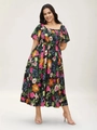 Close-up of smocked waist detail and colorful floral print on black midi dress - 1XL / Black Floral