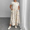 Maxikleid mit Blumenmuster, Bindeträgern und Taschen, kombiniert mit weißem T-Shirt - 3XL / Aprikose Floral (H)