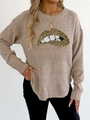 Dettaglio del motivo a labbra leopardate con paillettes sul maglione in maglia color avena - S / Albicocca (Labbra Leopardate)