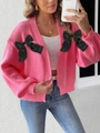 Pink knit cardigan featuring large black velvet bows and ribbed cuffs in a trendy style - S / Tops / Rose Red