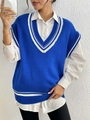 Detail of royal blue V-neck knit vest with white stripe texture and collegiate design - One Size / Tops / Blue
