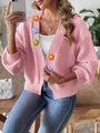 Detail of pink knitted cardigan featuring 3D floral appliques and ribbed texture knitwear - S / Tops / Pink