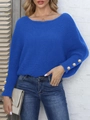 Détail de boutons perles dorés sur manches chauve-souris d'un pull bleu en maille - S / Bleu