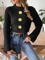 Detail of black cropped knit sweater featuring 3D floral embellishments and flared sleeves - S / Tops / Black