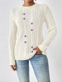 Close-up of off-white cable knit sweater featuring purple flower embroidery and round neck - S / Tops / White