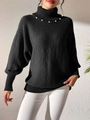 Détail d'un pull noir à col roulé élégant avec perles et manches chauve-souris larges - S / Noir