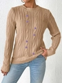 Detail of cable-knit texture and purple flower embroidery on a beige sweater - S / Tops / Khaki