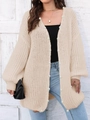 Detail of oversized cream knit cardigan with decorative white pearl buttons on the sleeves - One Size / Apricot