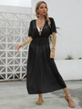 Detalle de pareo de malla transparente con cintura elástica y escote en V profundo - Talla única / Negro