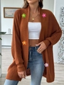Close-up of rust-orange knitted cardigan with colorful 3D crochet floral embellishments - One Size / Brown