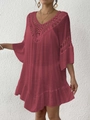 Close-up of crochet hollow embroidery and deep V-neck detail on the burgundy beach dress - One Size / Top And Bottom / Wine Red