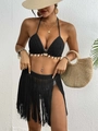 Detail of black crochet bikini top with white shell charms and high slit tassel skirt - One Size / Top And Bottom / Black