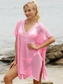 Detailed macro view of pink crochet beach cover-up with hollow knit diamond pattern - Pink
