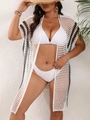 Primer plano del cover-up de playa de crochet blanco con costuras de rayas negras en contraste - Talla única / Blanco