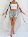Detail of bohemian print trim on white long-sleeve sun protection cardigan cover-up - One Size / Tops / White