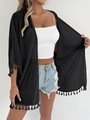 Detail of black chiffon kimono cardigan featuring elegant tassel trim on sleeves and hemline - S / Tops / Black