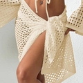 Set da spiaggia beige all'uncinetto con crop top a maniche lunghe e gonna a portafoglio - Taglia unica / Albicocca