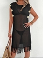 Detail of black crochet beach coverup featuring white floral accents and fringe hem - One Size / Tops / Black