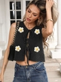 Cropped black knit vest with lace-up front and white 3D floral accents for women - S / Black