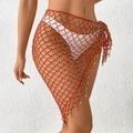 Detail of red crochet mesh beach wrap featuring gold beads and bohemian side-tie design - One Size / Tops / Red
