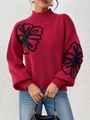 Détail du pull rouge à col montant avec broderies florales 3D noires et manches lanternes - S / Bordeaux