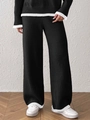 Damen Strickset in Schwarz mit weißen Kontrastkanten und Hose mit weitem Bein - S / Schwarze Hose