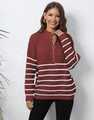 Detailed view of the striped knit sweater featuring a silver circular zip puller detail - One Size / Wine Red