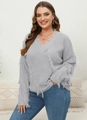 Detail of light grey V-neck knit sweater with bohemian fringe and distressed textures - Gray
