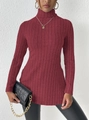 Detail of burgundy ribbed turtleneck sweater showing fine vertical texture and slim fit - Wine Red