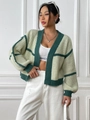 Detailed close-up showing the textured knit pattern and contrast stitching of the cardigan - S / Tops / Green