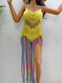 Detail of yellow handmade crochet beach cover-up featuring colorful long fringe tassels - One Size / Yellow