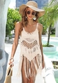Detalle del diseño de ganchillo calado y flecos largos en el vestido playero beige - Talla única / Albaricoque