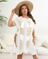 Dettaglio copricostume bianco in maglia traforata con trame strappate e frange naturali - Taglia unica / Bianco